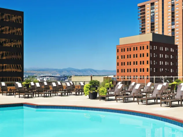 The Westin Denver Downtown hotels with rooftop ools and views of the rocky mountains and empower field at Mile High